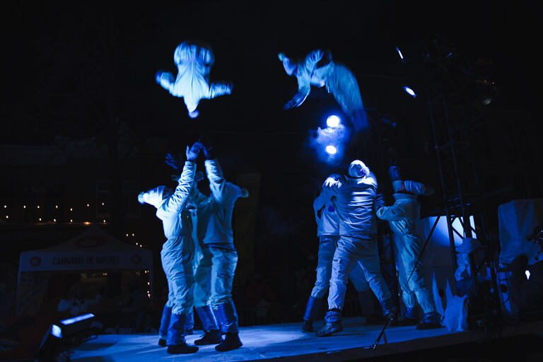 Acrobats throw each other into the air during the Carnaval de Québec (Quebec Winter Carnival) night parade - Leo Smith Photo Video